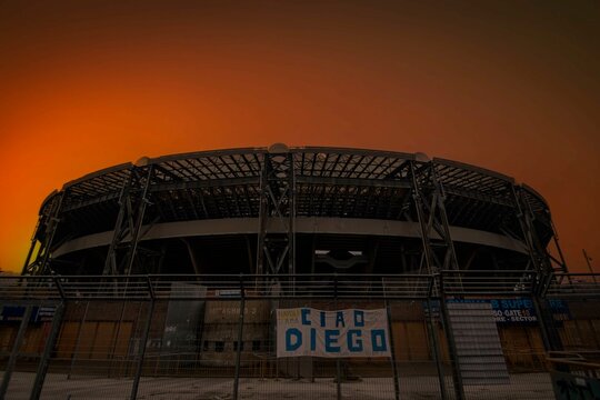 An orange sky over the Diego Armando Maradona Stadium, home to S.S.C. Napoli in Naples, Italy