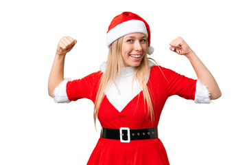 Young blonde woman with christmas hat over isolated chroma key background doing strong gesture