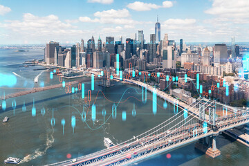 Aerial panoramic helicopter city view of Lower Manhattan and Downtown financial district, New York, USA. Forex graph hologram. The concept of internet trading, brokerage and fundamental analysis