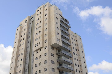 Modern residential multi-storey building. Concept: construction, real estate, housing for families