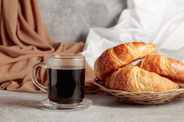 Croissants and black coffee.