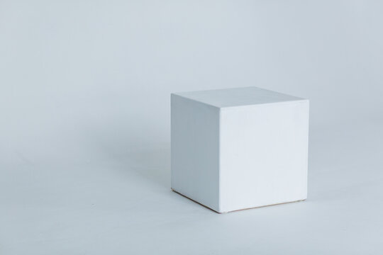 White cube on a light background