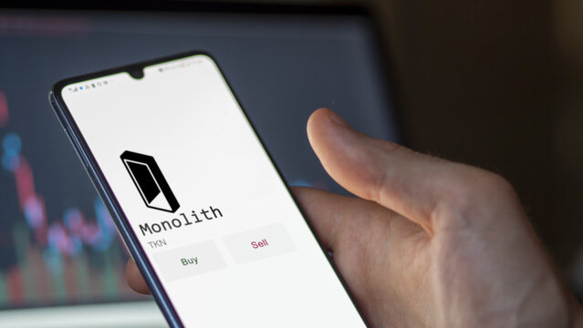 March 27 2023 London UK. An investor analyzing the Monolith coin  to invest in TKN
