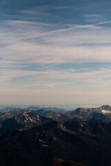 Fototapeta na wymiar Mountain range in snow in Alps in sunny day
