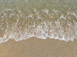 wave on the sand