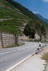 View on road in mountains in Alps in sunny day