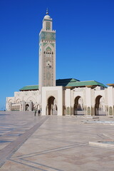Fototapeta na wymiar The Hassan II mosque with minaret, Casablanca city, Morocco - vertical