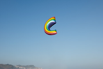 a rainbow balloon on air