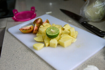 Healthy Cooking Ingredients: Potatoes, Tomatoes, and Lime