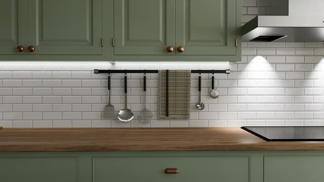 Green kitchen interior with island. Stylish kitchen with wooden worktop.