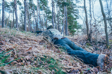 Soldier in a trench. Member of the International Legion patrols. The war in Ukraine.Army soldier Patrolled the front line