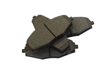 set of brake pads for cars,lie on a pile of new brake pads on a white background