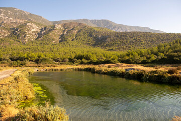 autumn landscape with lake in the mountain