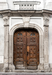 Fototapeta na wymiar Carved wooden old door 