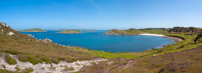 Panoramic view over Gimble Porth from Tregarthen Hill on the island of Tresco, Isles of Scilly, UK