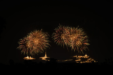 Fireworks above the mountain with the ancient royal palace known as "Phra Nakhon Khiri," Phetchaburi Province, Thailand, create a city of heaven's splendour.