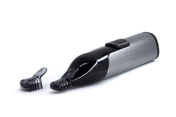 Nose and ear trimmer on a white background with a nozzle, hair cutting