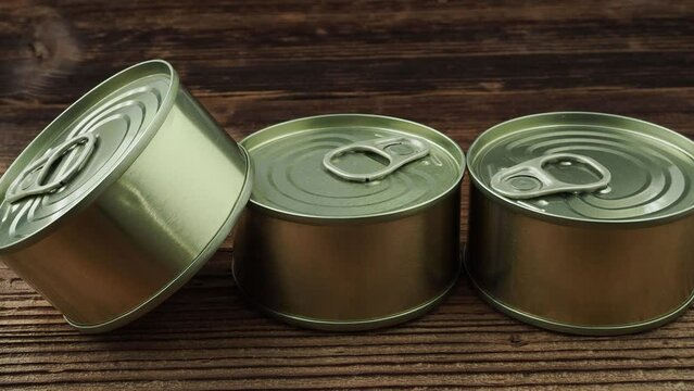 Tin cans with food on the table