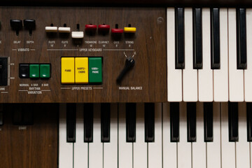 Electric organ keys. old electric organ. Old fashioned double keyboard electric organ.