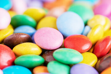 Colorful glossy candy balls. Multi Colored chocolate candy