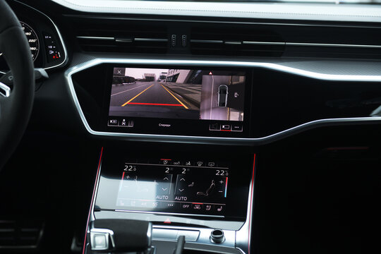 Belarus, Minsk - 24.01.2023: Interior of premium car Audi RS 7 Sportback. Interior of premium car with rearview camera dynamic trajectory turning lines and parking assistant steering wheel.