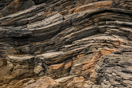 Full frame shot of the bizarre layered rocks near Tramore beach, Kiltoorish, County Donegal, Ireland