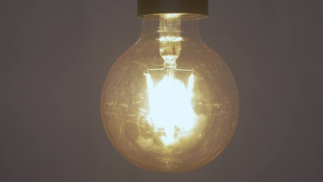 Close Up Of Light Bulb Switching On