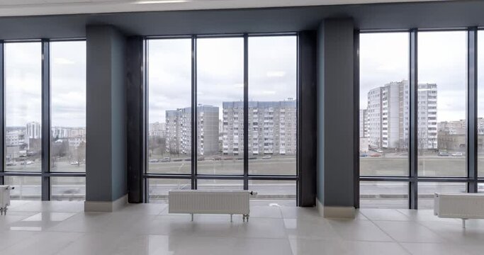 loop rotation and panoramic view in empty modern hall with columns, doors and panoramic windows.