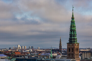 Fototapeta na wymiar Elevated city perspective in cold windy day from the Round tower of Copenhagen, the capital of Denmark