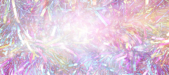 Fototapeta premium Party tinsel messy random fun background - multicoloured shiny glittering tinsel ideal for a new year party invitation template 