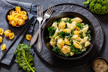 cheesy baked pasta with green leafy kale