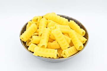Festonati pasta in a dark grey bowl, isolated on a white background