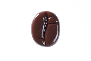 glossy coffee grain on a white background, isolated, top view