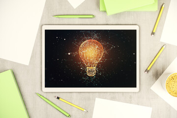 Creative light bulb illustration on modern digital tablet display, future technology concept. Top view. 3D Rendering