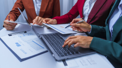 small business accounting team meeting three asian people with salary monthly charts data, basic...