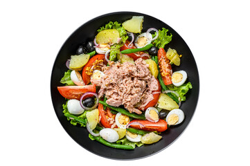 Healthy hearty salad with tuna, green beans, tomatoes, eggs, potatoes and black olives in a plate.  Isolated, transparent background.