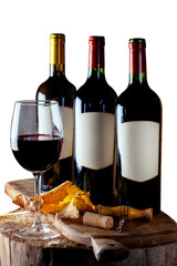 Glass and bottles of red and white wine