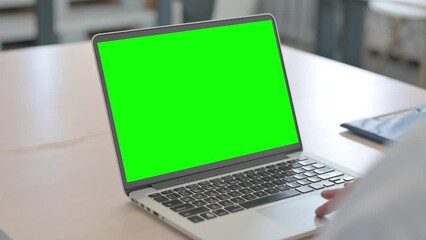 Doctor Using Laptop with Green Screen
