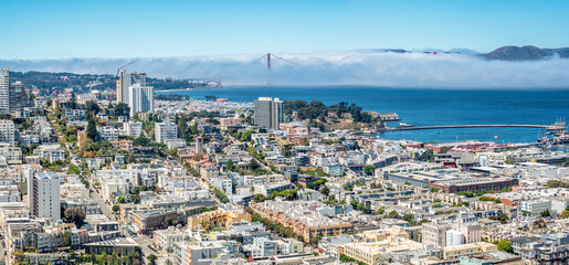 Fototapeta na wymiar San Francisco view from top of the historical Coit Tower across the panoramic city shape
