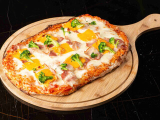 pizza on a wooden board