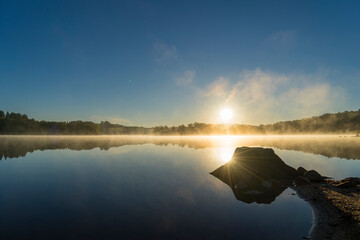 Sunrise with sunlight reflection, november, Saint Pardoux Lake