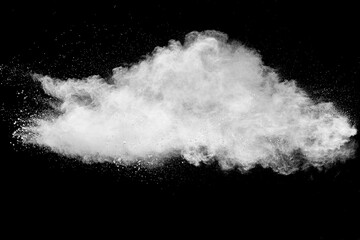 White talcume powder explosion on black background. White dust particles splash.