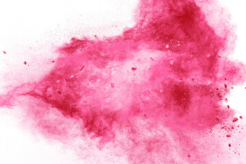 Split debris of stone exploding with pink powder against white background.