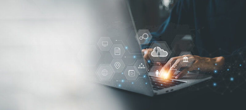 Businessman is using a laptop to access the cloud computing system , Storage and data transfer Cloud network , Cloud technology. Networking and internet service concept