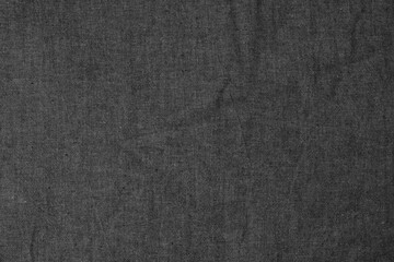 Fototapeta na wymiar Gray wrinkled fabric as a background