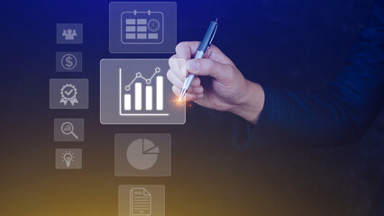 Big data analytics and business intelligence BI concept with chart and graph icons on digital screen interface and business people in the background.