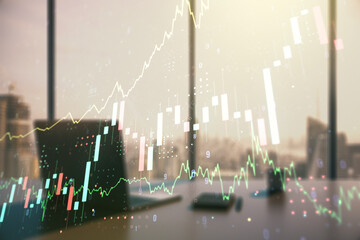 Abstract creative financial graph and modern desktop with pc on background, financial and trading concept. Multiexposure