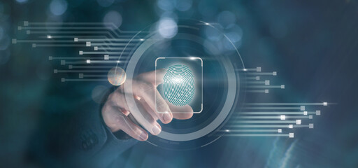 Businessman scan fingerprint to unlock the system. Business technology safety Internet concept.