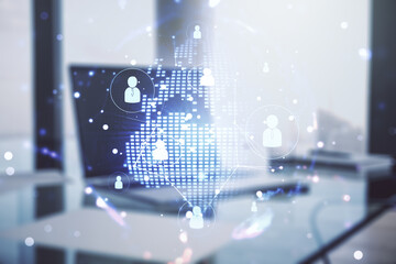 Social network concept with world map and modern laptop on background. Multiexposure