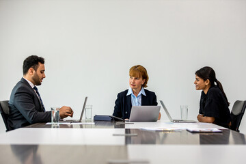 Diverse colleagues gather in brainstorm discuss statistics together. Group of people colleagues gather doing Brainstorming business plan together. Team Brainstorm Working Concept.